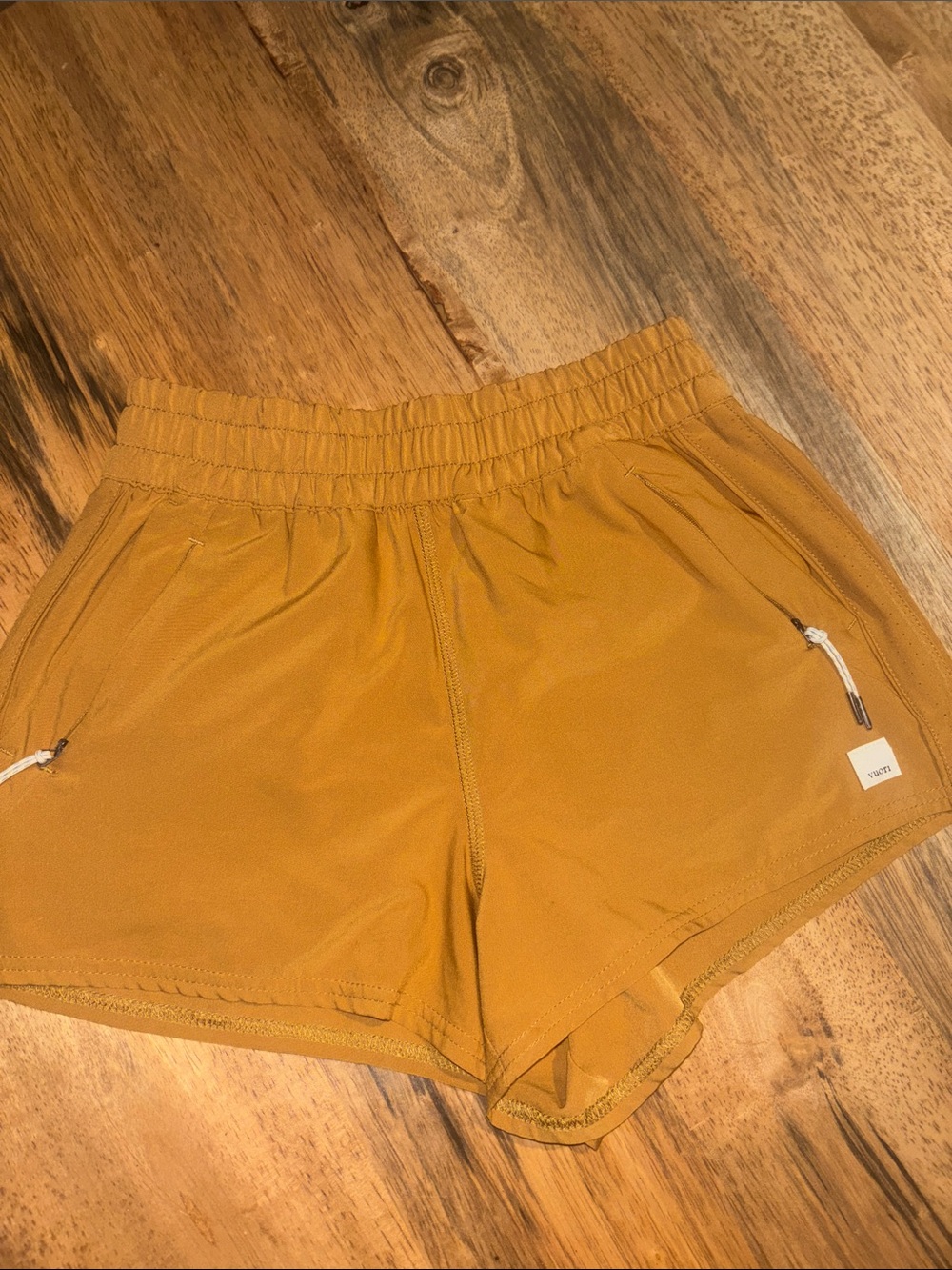 Vuori Women's Mustard Yellow Athletic Shorts with Zipper Pockets